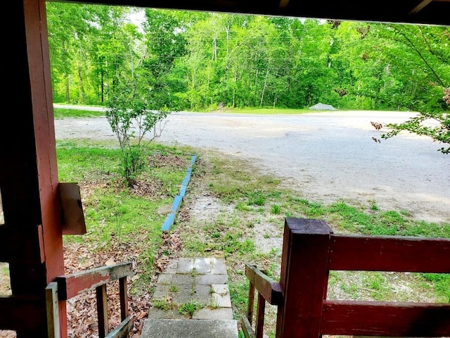 property view of water with a forest view