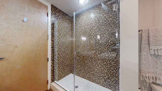 bathroom with a stall shower