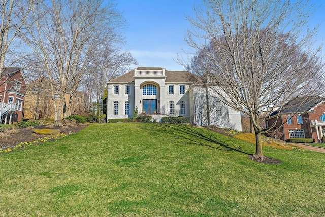 view of front of house with a front lawn