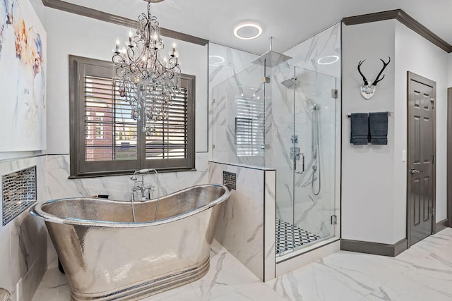 bathroom featuring marble finish floor, a marble finish shower, tile walls, crown molding, and a freestanding bath