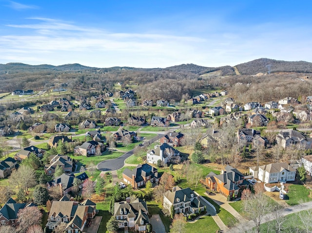 birds eye view of property featuring a mountain view and a residential view