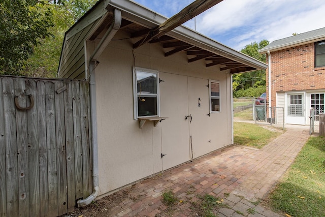 view of outdoor structure with fence