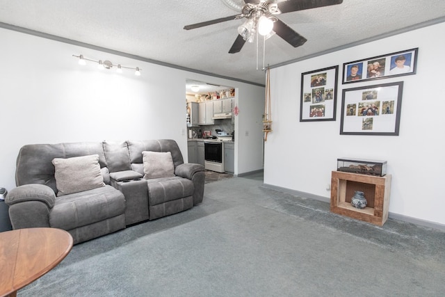 carpeted living area featuring baseboards, a textured ceiling, bar, and ceiling fan