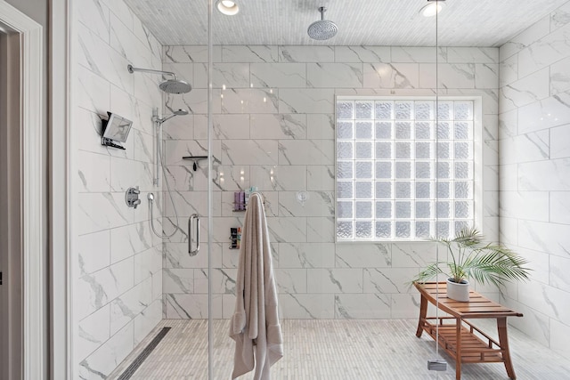 bathroom featuring visible vents and a stall shower