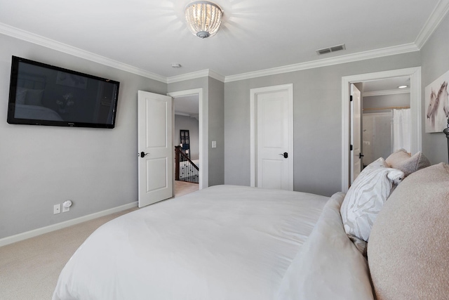 bedroom with crown molding, carpet, baseboards, and visible vents