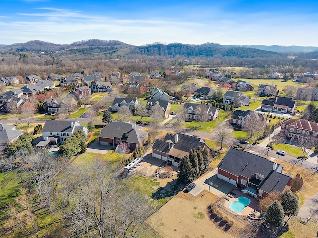 birds eye view of property with a residential view and a mountain view