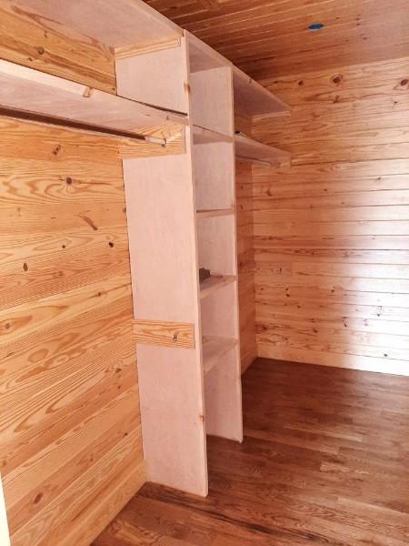 spacious closet featuring wood finished floors