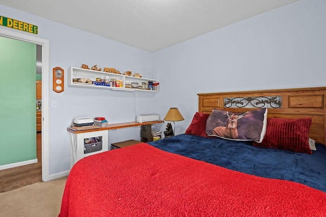 bedroom with carpet flooring and baseboards