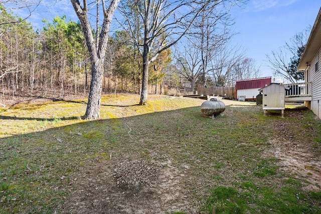 view of yard with a shed and an outdoor structure