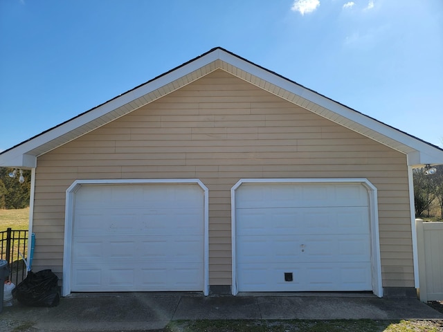 detached garage with fence