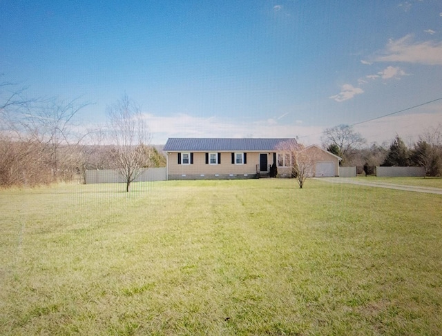 ranch-style home with a front lawn, fence, metal roof, a garage, and crawl space