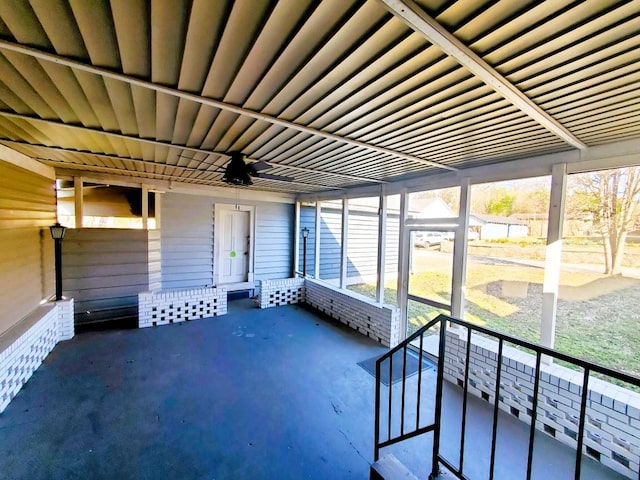 unfurnished sunroom featuring plenty of natural light