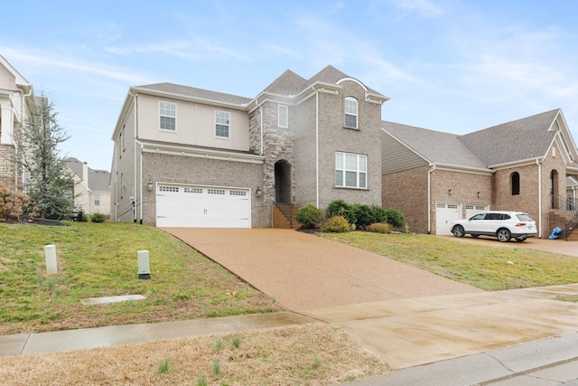 traditional home featuring brick siding, an attached garage, driveway, and a front yard