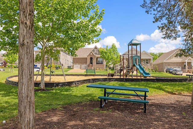 community jungle gym with a lawn