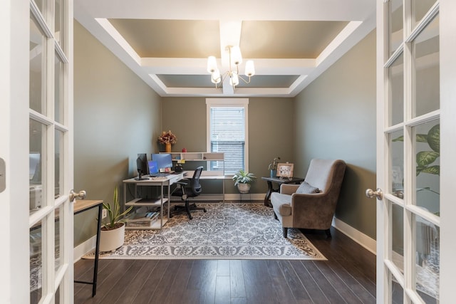 office space featuring a notable chandelier, baseboards, dark wood-type flooring, and french doors