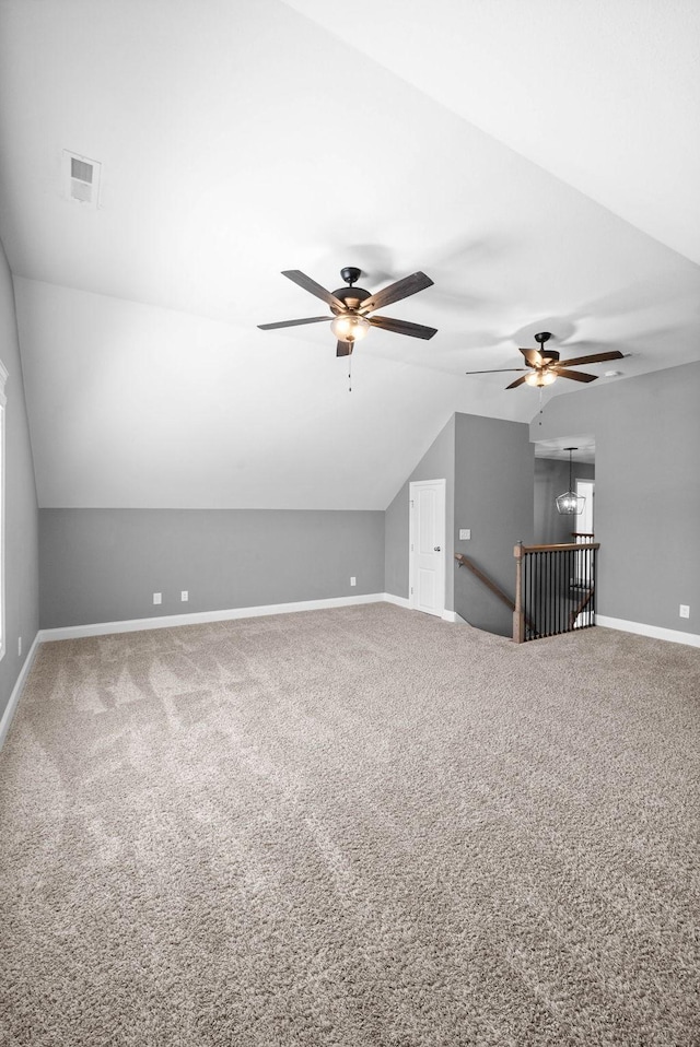 additional living space featuring visible vents, baseboards, and carpet