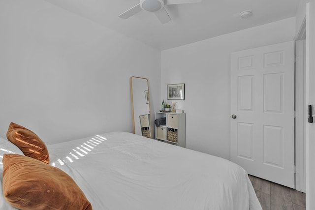 bedroom featuring ceiling fan and wood finished floors