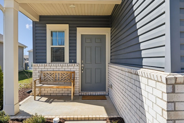 doorway to property with covered porch