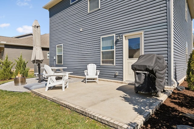 view of patio / terrace with a fire pit