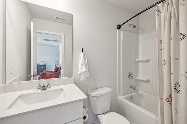 bathroom featuring visible vents, toilet, shower / bath combo, and vanity