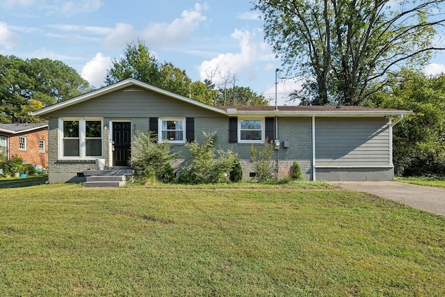 ranch-style house featuring a front yard, brick siding, and crawl space