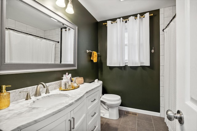 bathroom featuring vanity, visible vents, baseboards, tile patterned flooring, and toilet