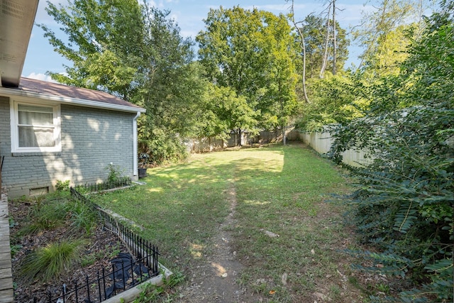 view of yard featuring a fenced backyard