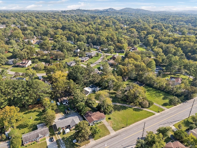 aerial view featuring a view of trees