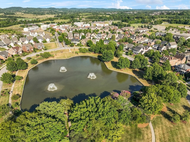 aerial view featuring a residential view and a water view