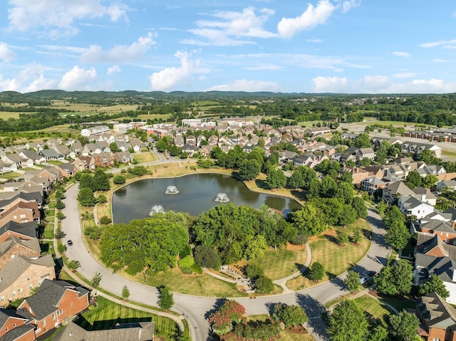 aerial view with a residential view and a water view