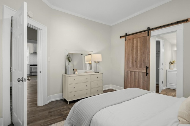 bedroom featuring a barn door, baseboards, and dark wood-style flooring