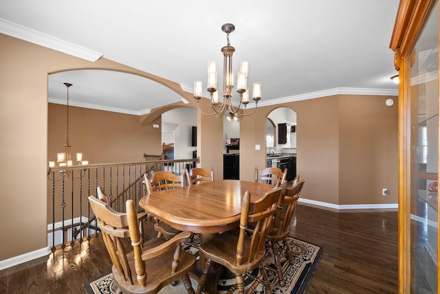 dining space with arched walkways, a notable chandelier, and wood finished floors