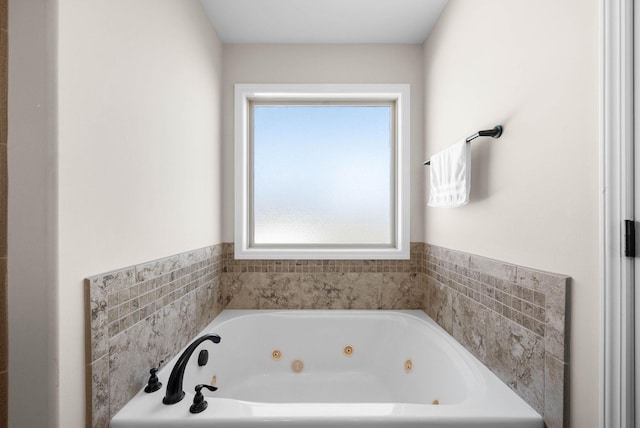 full bath featuring a jetted tub