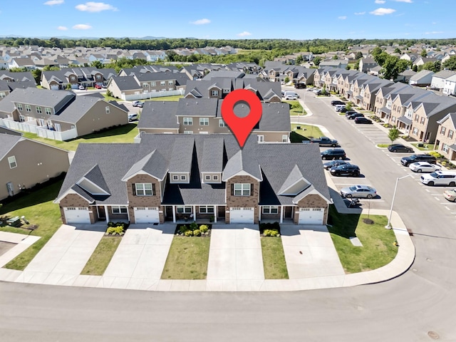 drone / aerial view with a residential view