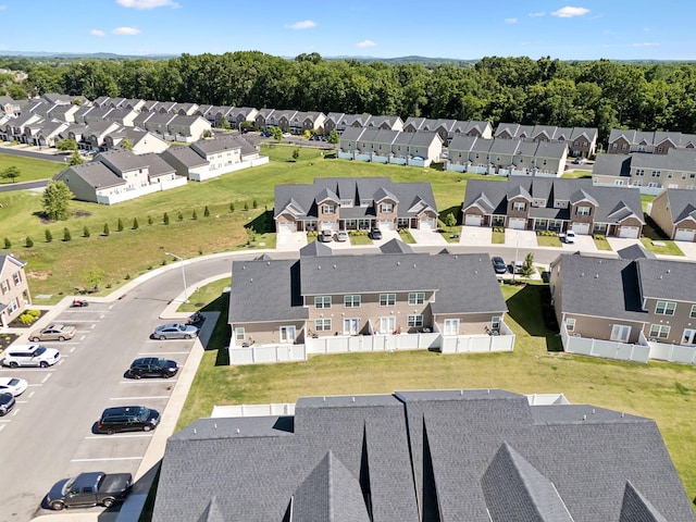 birds eye view of property with a residential view