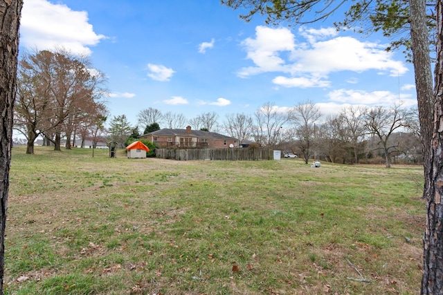 view of yard featuring fence