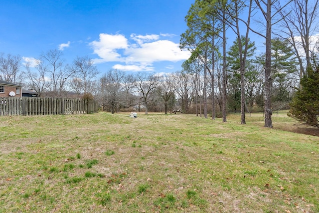 view of yard with fence