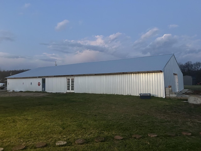 view of outbuilding featuring an outdoor structure and french doors