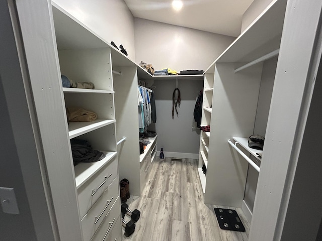 spacious closet with light wood-type flooring