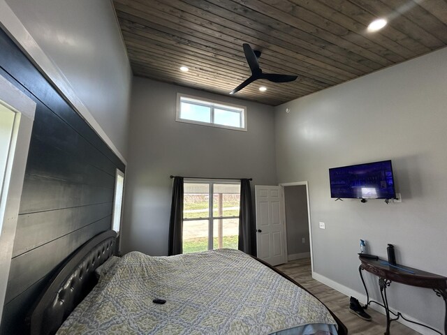 180 Schultz Ln, Huntland, TN 37345 - bedroom with wood finished floors, recessed lighting, a high ceiling, baseboards, and wood ceiling