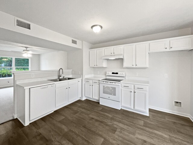 9004 Nathanael Dr, La Vergne, TN 37086 - kitchen with white appliances, a sink, a peninsula, under cabinet range hood, and dark wood-style flooring
