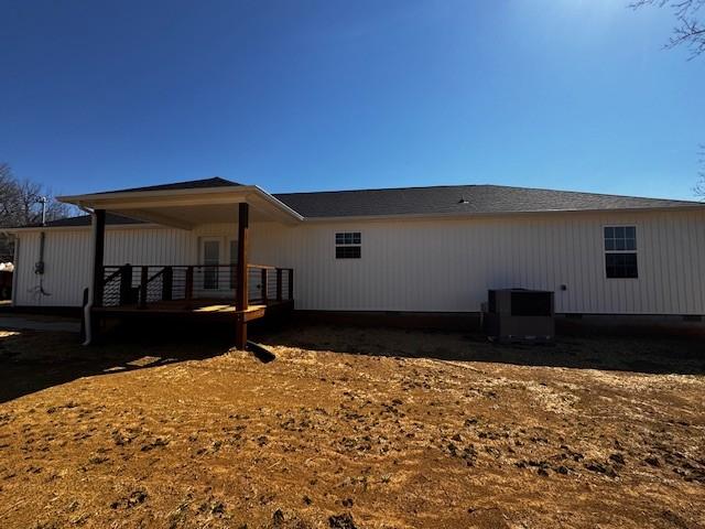 view of home's exterior with central air condition unit