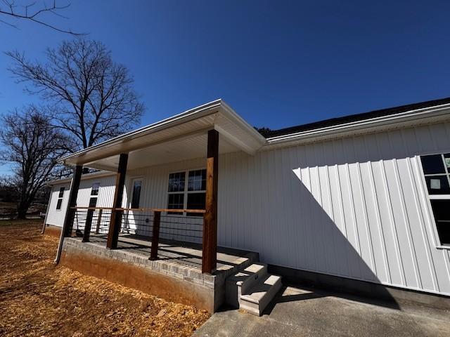 view of home's exterior featuring a porch