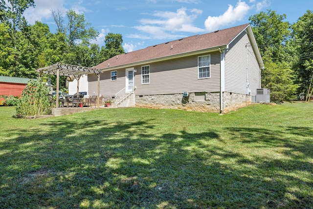 back of house with a patio area, entry steps, a yard, crawl space, and a pergola