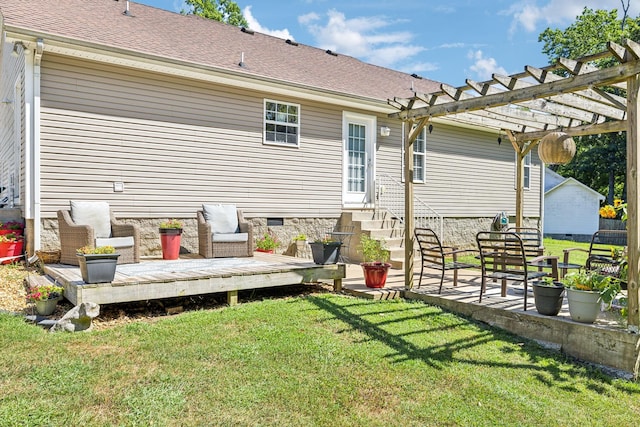 rear view of house with a shingled roof, a wooden deck, a lawn, crawl space, and a pergola