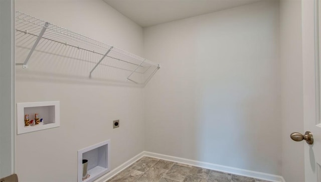 laundry room featuring electric dryer hookup, baseboards, hookup for a washing machine, and laundry area