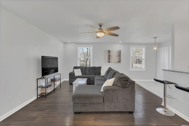 living area with ceiling fan, baseboards, dark wood-style floors, and recessed lighting