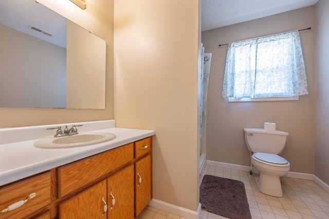 bathroom with visible vents, toilet, a shower with curtain, baseboards, and vanity