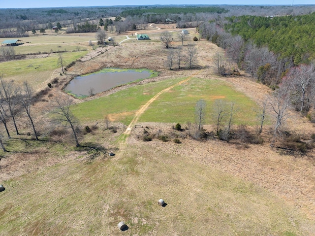 bird's eye view featuring a rural view and a water view