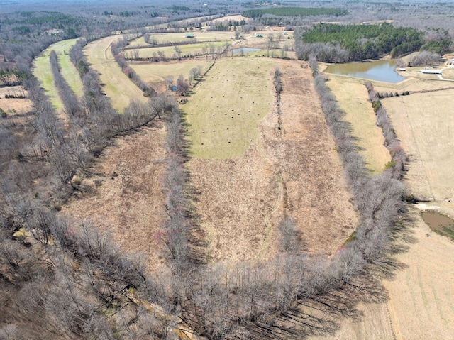 aerial view with a water view and a rural view